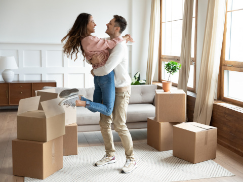 Happy couple in their new home