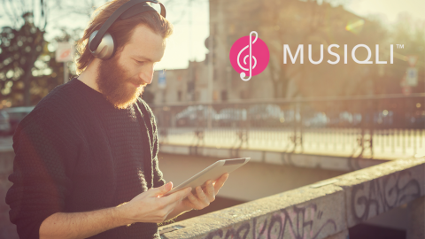 Musiqli brand imagery featuring a man using an iPad
