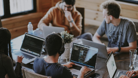 Photo of startup co-founders working on laptops